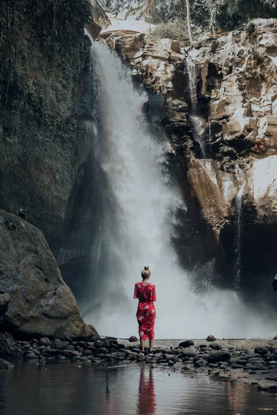 Young Woman Admiring Beautiful Waterfall — Stock Photo, Image