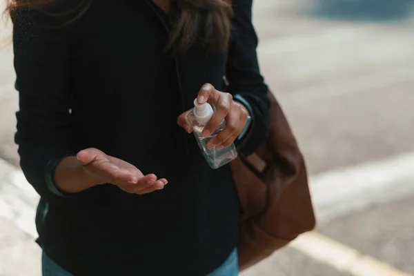 Young Woman Washing Hands Using Sanitizer Royalty Free Stock Photos