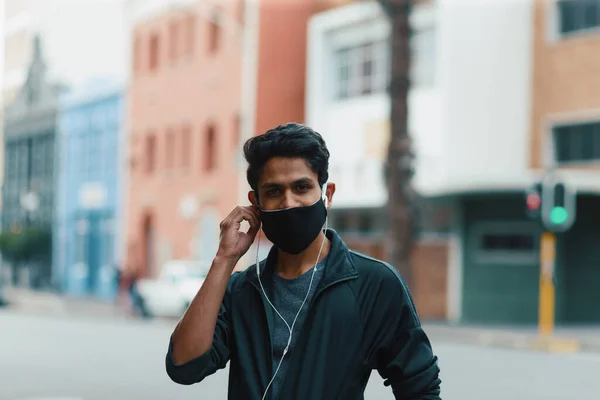 Young Man Wearing Face Mask City Street Listening Music Royalty Free Stock Images