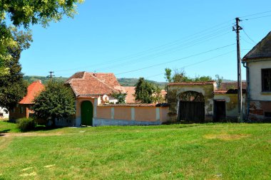 Tipik kırsal manzara ve köylü evlerde köyü Merghindeal - Mergenthal, Transilvanya, Romanya. Yerleşim 1336, ancak müstahkem kilise tarihi 13. yüzyılın ikinci yarısında sertifikalı ilk kez yapıldı..