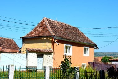 Romanya 'nın Cincu, Grossschenk, Transilvanya kentindeki tipik kırsal alan ve köylü evleri. Yerleşim yeri Sakson koloniciler tarafından 12. yüzyılın ortalarında kuruldu.