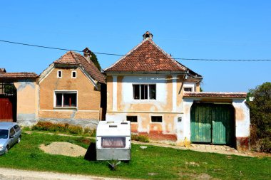Romanya 'nın Cincu, Grossschenk, Transilvanya kentindeki tipik kırsal alan ve köylü evleri. Yerleşim yeri Sakson koloniciler tarafından 12. yüzyılın ortalarında kuruldu.