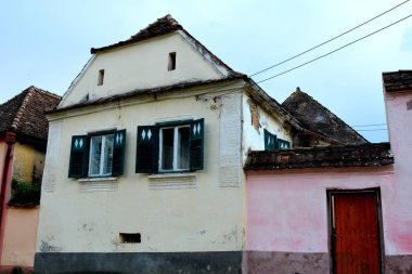 Dealu Frumos, Schoenberg, Merghindeal komün Sibiu County, Transilvanya, Romanya bir köyde evler tipik kırsal manzara ve köylü. İlk geri kalma 1280 için Satılık-satın alma eyleminde belirtilmiştir.