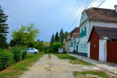 Dealu Frumos, Schoenberg, Merghindeal komün Sibiu County, Transilvanya, Romanya bir köyde evler tipik kırsal manzara ve köylü. İlk geri kalma 1280 için Satılık-satın alma eyleminde belirtilmiştir.
