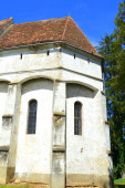 Erődített középkori szász evangélikus templom a falu Grossschenk, Cincu, Erdély, Románia. A települést a szász telepesek alapították a 12. század közepén.