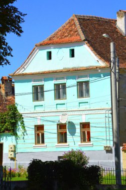 Romanya 'nın Cincu, Grossschenk, Transilvanya kentindeki tipik kırsal alan ve köylü evleri. Yerleşim yeri Sakson koloniciler tarafından 12. yüzyılın ortalarında kuruldu.