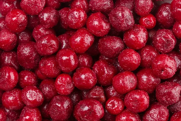 Cerises congelées sur fond de pile — Photo