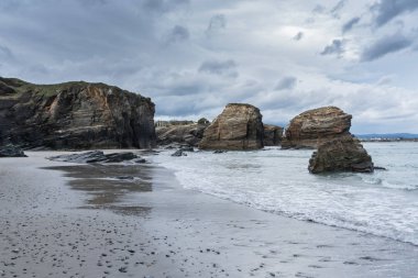 Famous beach of Playa de Las Catedrales in Ribadeo. Galicia, Spain. clipart
