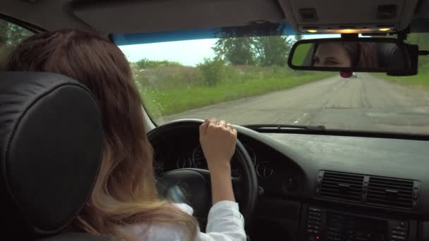 Woman Driver Hand Steering Wheel Blurred Background Road Summer Time — Stock Video