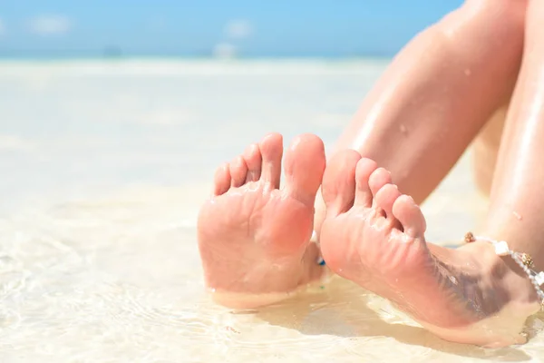 feet, sole of feet against the sea Pedicure and foot Spa .Care for the heels and soles of the feet