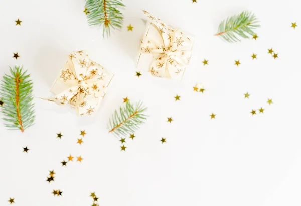 Christmas flat lay composition. Christmas gift and branches. Top view, copy space — Stock Photo, Image