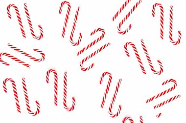 Beyaz arka planda Noel şeker kamışı deseni. Düz döşeme ve üst görünüm