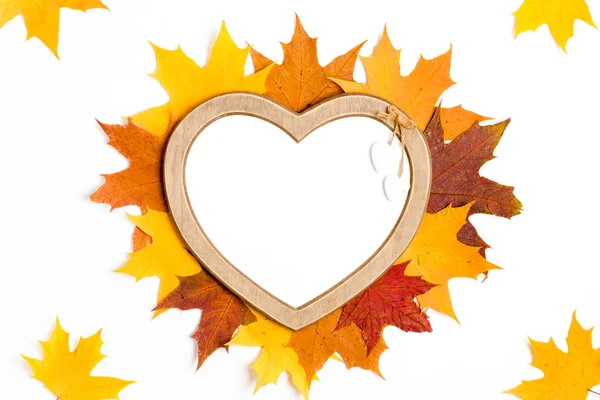 Autumn composition, maple leaves, heart shaped frame, top view, flat lay. Autumn, fall, halloween concept — Stock Photo, Image