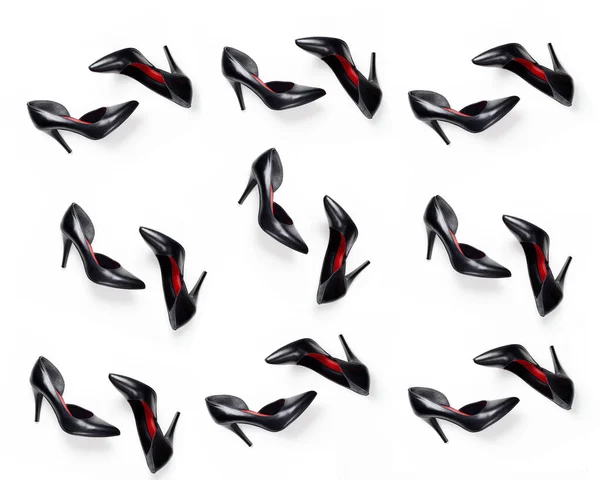 Patroon van zwart, vrouwen, leren schoenen met hoge hakken op een witte achtergrond. Achtergrond voor blog, schoenenwinkel, schoenenfabrikant — Stockfoto