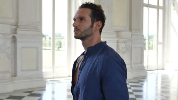 Handsome Man Looking Around Inside a Museum — Stock Video