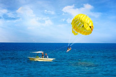 Parasailing in Aegean Sea in city of Rhodes (Rhodes, Greece)