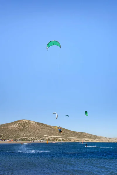 Kitesurfer in big jump in air on Prasonisi beach (Rhodes, Greece)