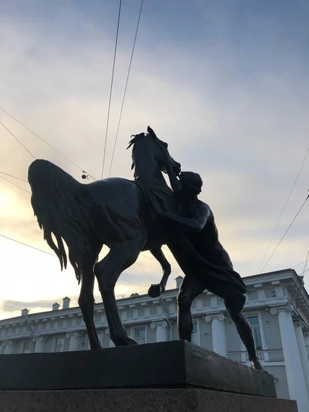 Beautiful statue of a man and horse in St. Petersburg