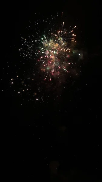 Beautiful view of fireworks on the street at night