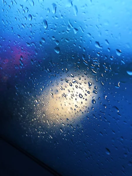 Beautiful view of the mirror and rain from the car