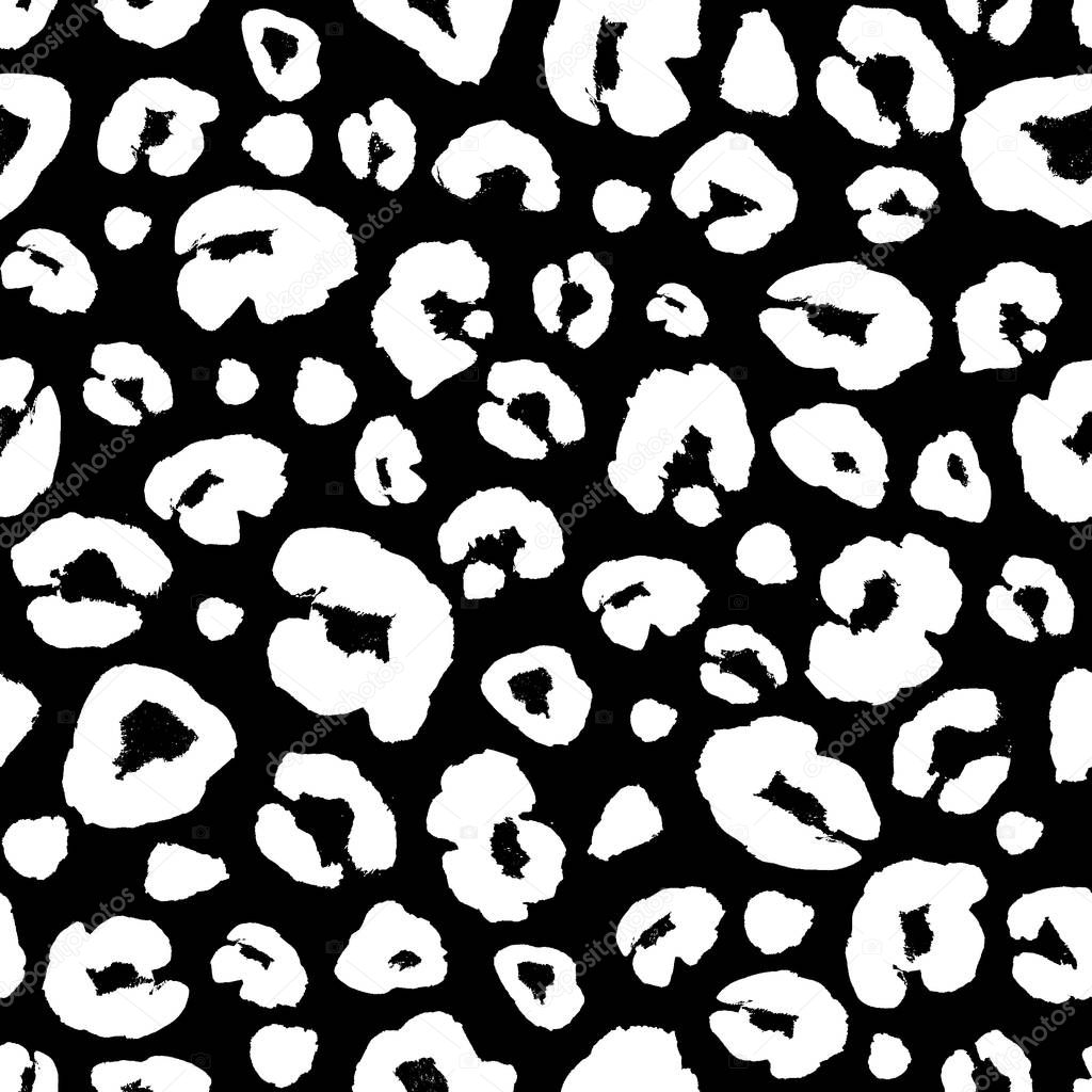 Leopard skin white and black seamless pattern. Hand drawn animal fur skin texture. White spots ornament on black background. Print for textile, wallpaper, wrapping