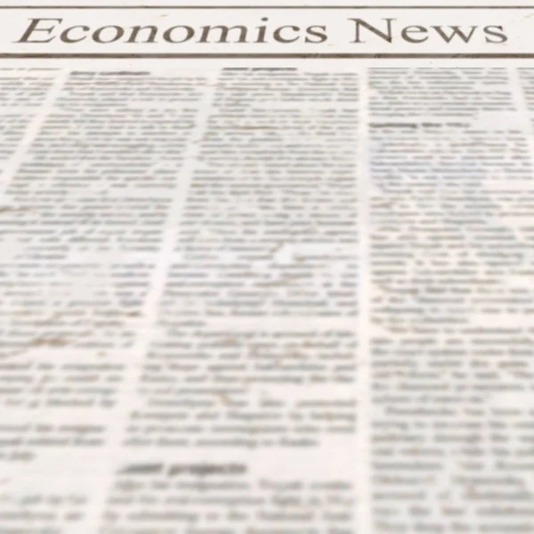 Periódico con titular Economics News y viejo texto ilegible — Foto de Stock