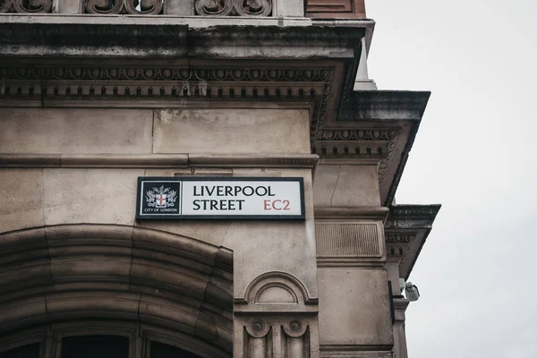 Street name sign on a side of a building on Liverpool Street, City of London, UK.