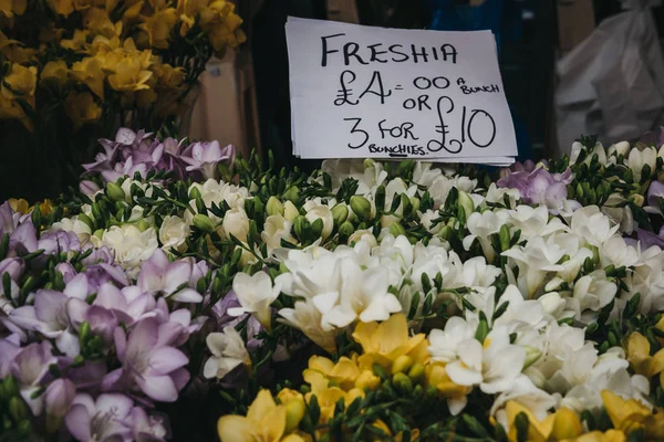 Beautiful bouquets of flowers for sale at a street market.