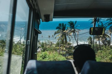 Cherry Tree, Barbados - July 27, 2018: View of Cherry Tree Hill, Barbados, from a bus. Located 850 feet above sea-level, Cherry Tree Hill offers an excellent views and is a popular tourist spot. clipart