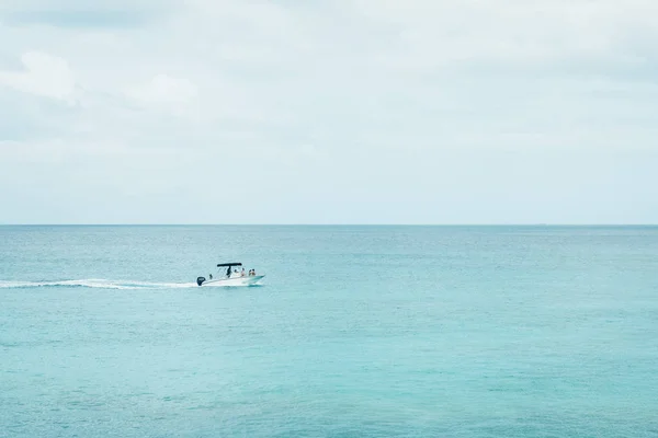 stock image Unidentified boat in the turquoise water of Carlisle Bay, Bridgetown, Barbados.