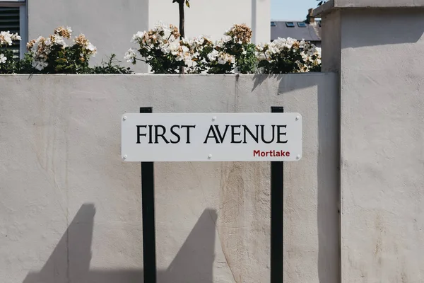 First Avenue street name sign in Barnes, borough of Richmond upon Thames, London, UK.
