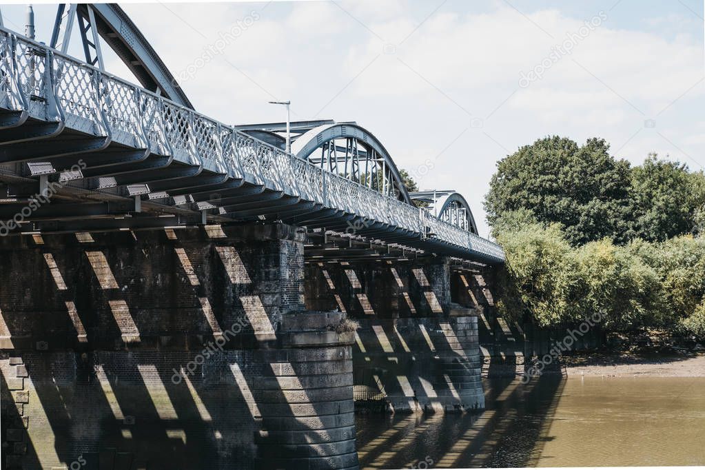 Barnes Railway Bridge on a bright sunny day, London, UK.