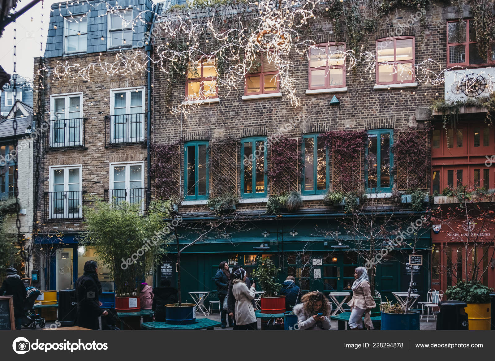 People Under The Christmas Lights In Neal S Yard Covent Garden