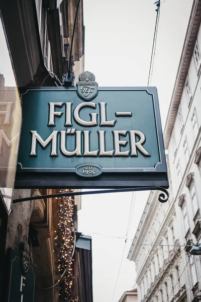 Vienna, Austria - November 24, 2018: Sign outside Figlmuller on Wollzeile restaurant in Vienna. Opened in 1905, it is often referred to as the Home of the Schnitzel.