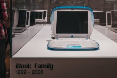 Prague, Czech Republic - August 28, 2018: Family of iBooks on display inside Apple Museum in Prague, the largest private collection of Apple products around the world. clipart