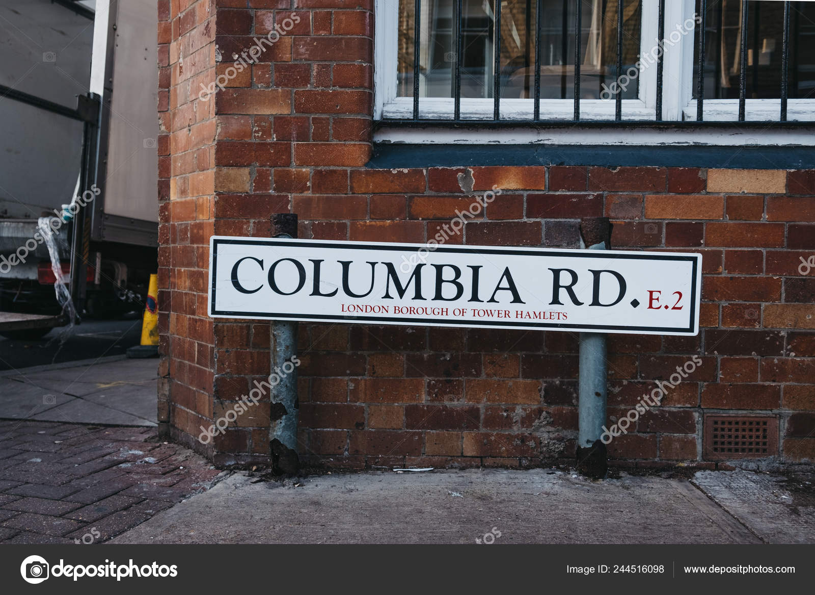 Letrero Nombre Calle Columbia Road Metal Contra Pared Ladrillo