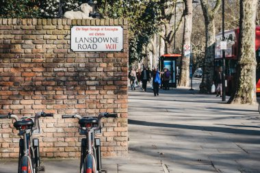 Santander cycles on Lansdowne Road, Holland Park, London, UK. clipart