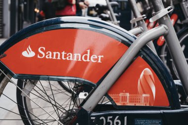 Close up of Santander bicycles on a street in London, UK. clipart