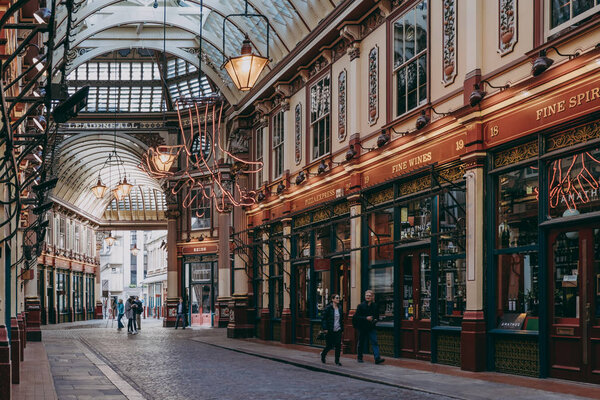 Name above shops and cafes at the arcade of Leadenhall Market, L