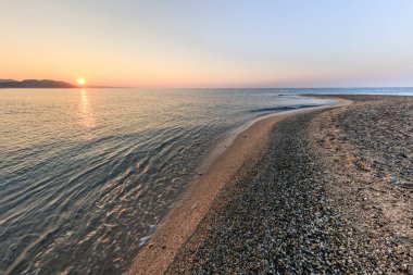 Possidi Cape plajında gün doğumu, Yunanistan