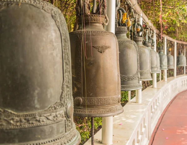 Old bells in a buddhist temple of Thailand