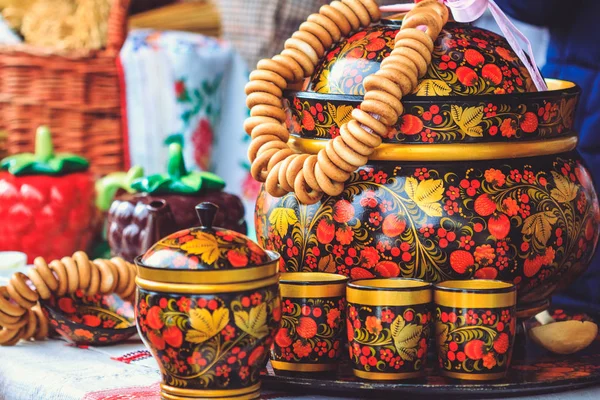 Wooden beautiful Russian dishes with Khokhloma