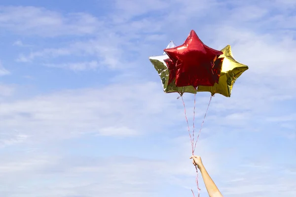 Colorful Golden Shiny Star Shaped Balloons Background Blue Sky Clouds — Stock Photo, Image