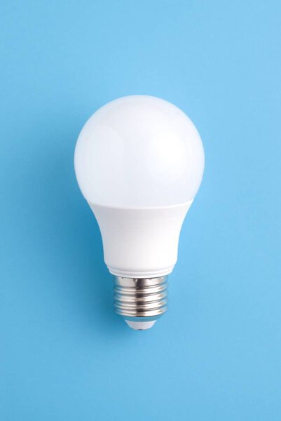 White lightbulb on a blue background