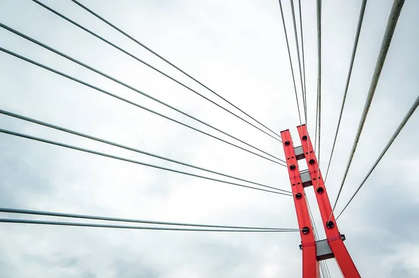 Red bridghe tower with stainless steel wires