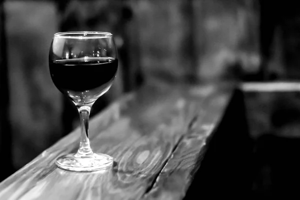Glass of wine in black and white