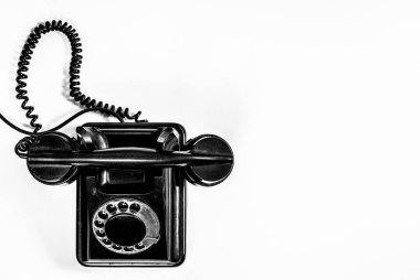 Bir kulaklık ve sarmal kablo Vintage siyah telefon