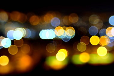 Bulanık renkli ışık daireleri. Işık çemberleriyle bulanık arkaplan.