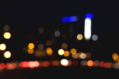 Bulanık renkli ışık daireleri. Işık çemberleriyle bulanık arkaplan.