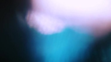 Fütüristik çok renkli lens fişekleri. Şıklığı ve soyut bulanık parçacıklar.